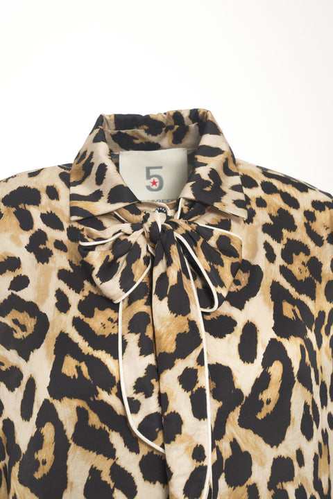 Blusa con collo a fiocco