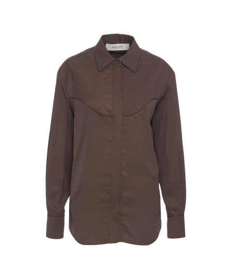 Blusa con dettagli trapuntati