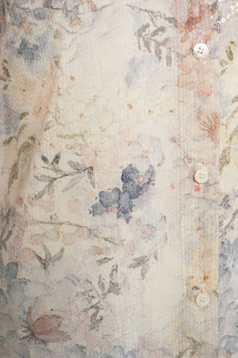 Blusa con paillettes e stampa floreale