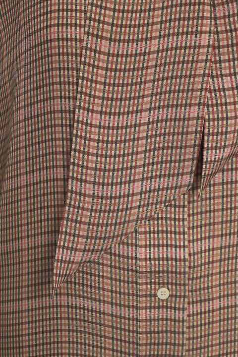 Blusa con collo a fiocco