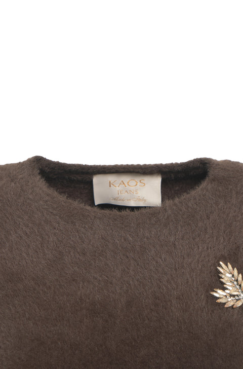 Maglione teddy con spilla