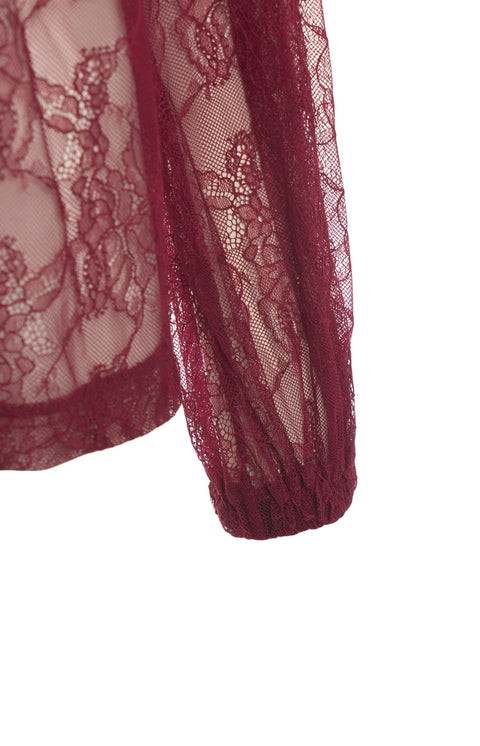 Camicia in pizzo con dettagli a fiocco