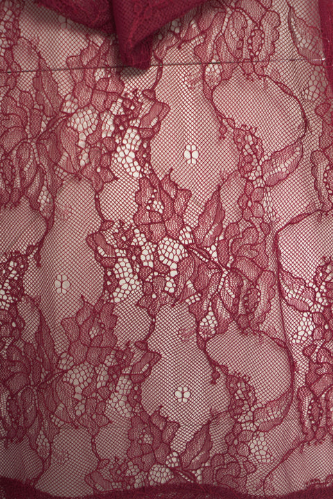 Camicia in pizzo con dettagli a fiocco