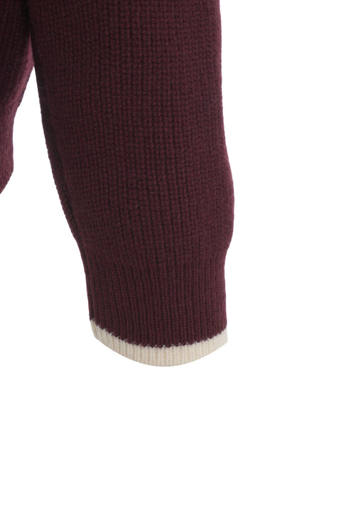 Maglione a righe con colletto polo