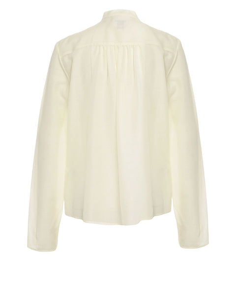 Blusa con collo a fiocco