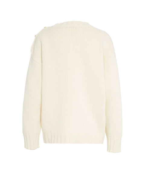 Maglione con bottoni decorativi