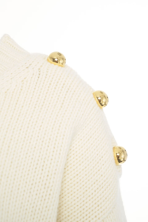 Maglione con bottoni decorativi