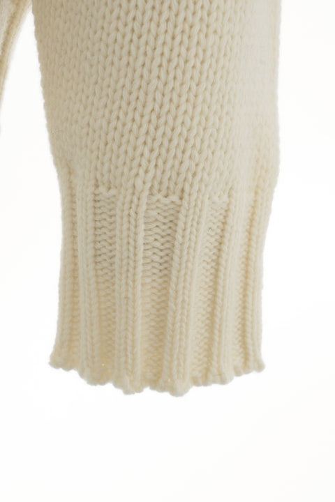 Maglione con bottoni decorativi