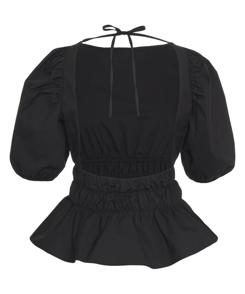 Blusa con maniche a sbuffo