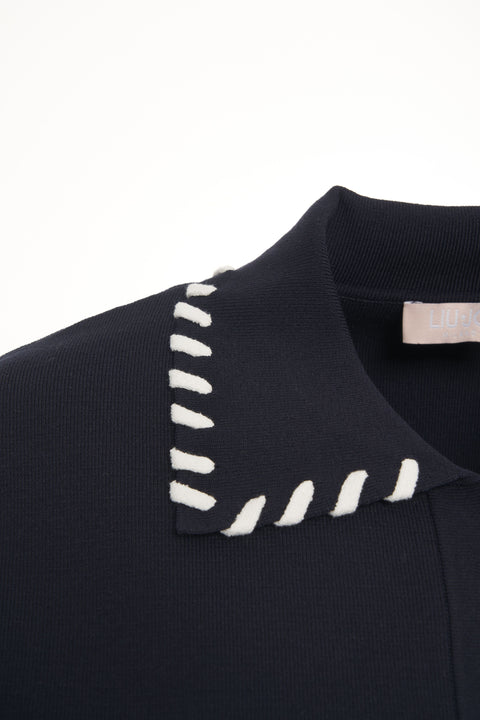 Giacca con impunture decorative