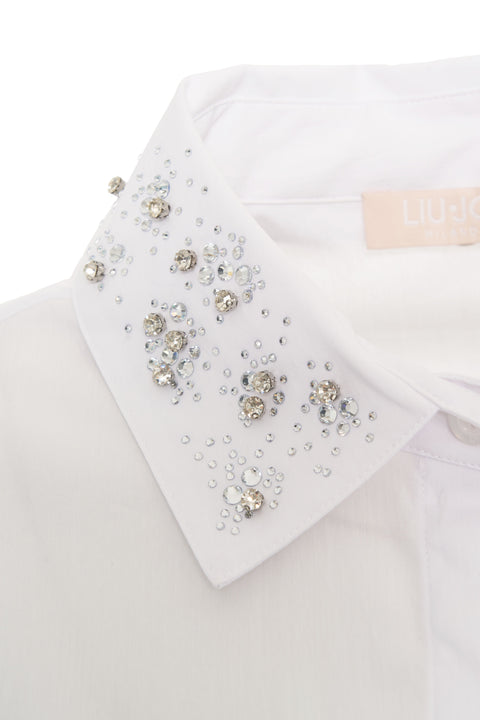 Blusa con applicazione strass