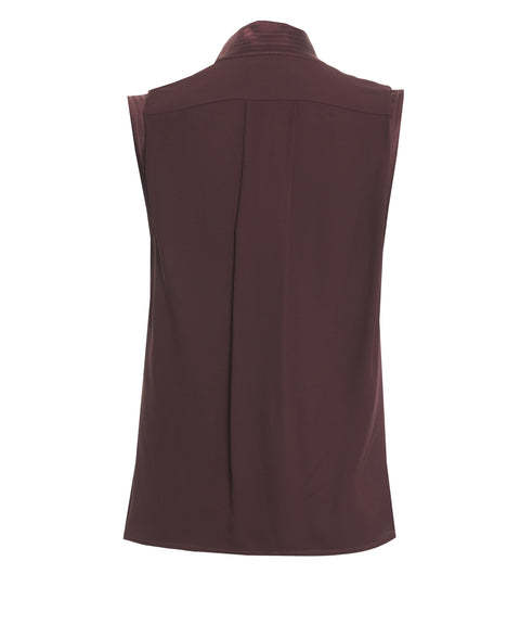 Top con scollo a cascata