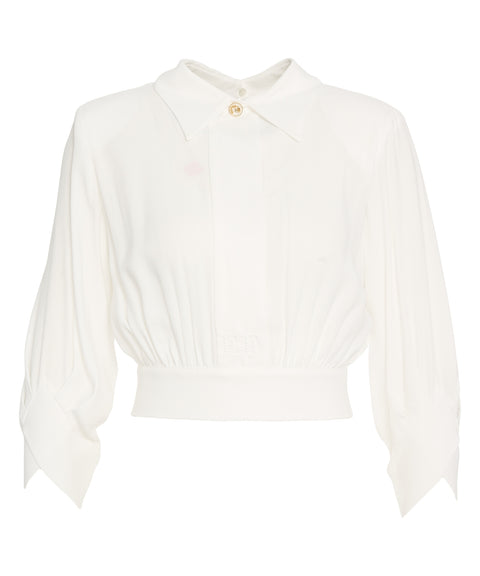 Blusa con dettaglio logo