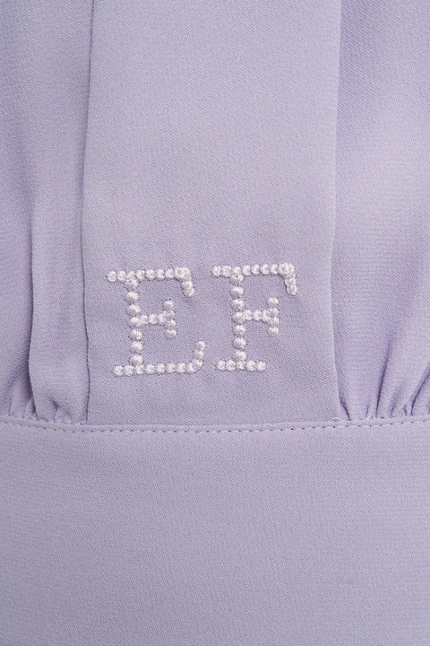 Bluse mit Logodetail