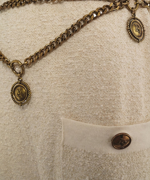 Tuta in maglia bouclé con cintura