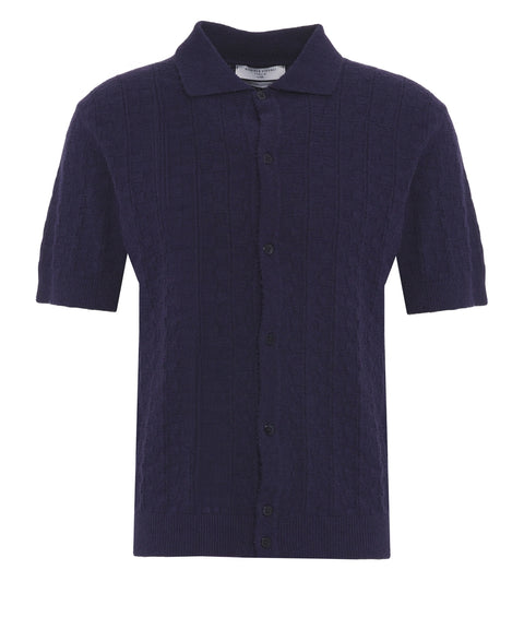 Polo in maglia a trecce