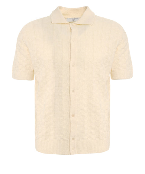 Polo in maglia a trecce