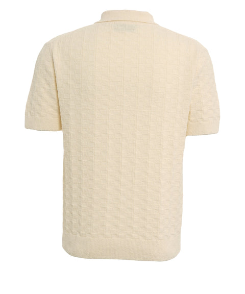 Polo in maglia a trecce