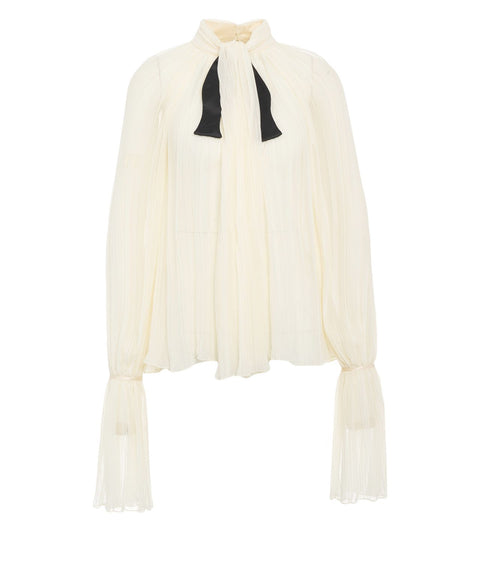 Blouse with pleated folds