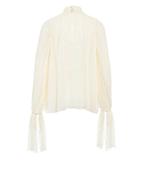 Blouse with pleated folds
