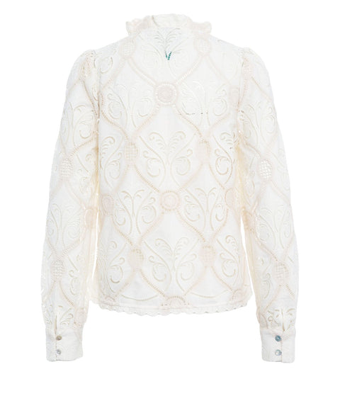 Blusa con ricami