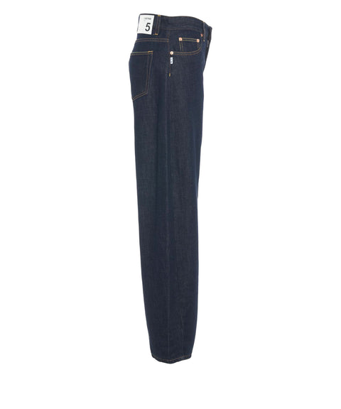 Jeans con tasca applicata