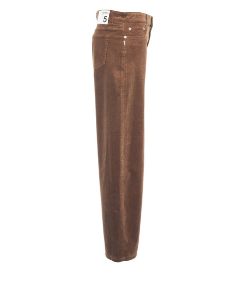 Jeans con tasca applicata