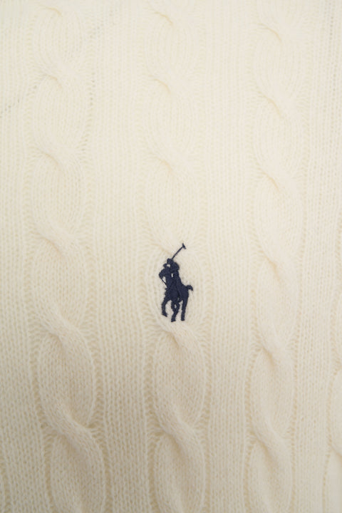 Rollneck sweater with cable knit pattern