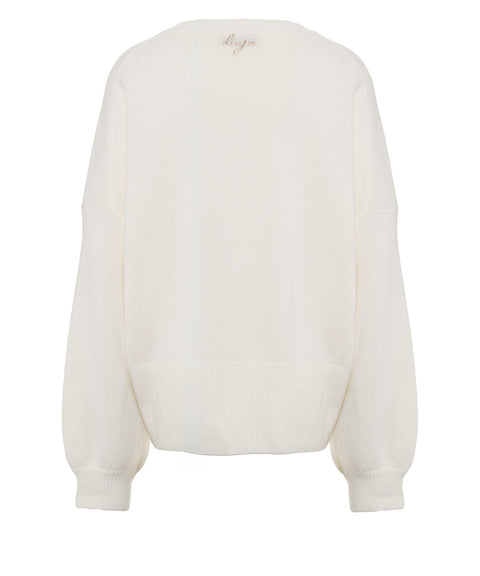 Pullover con spilla